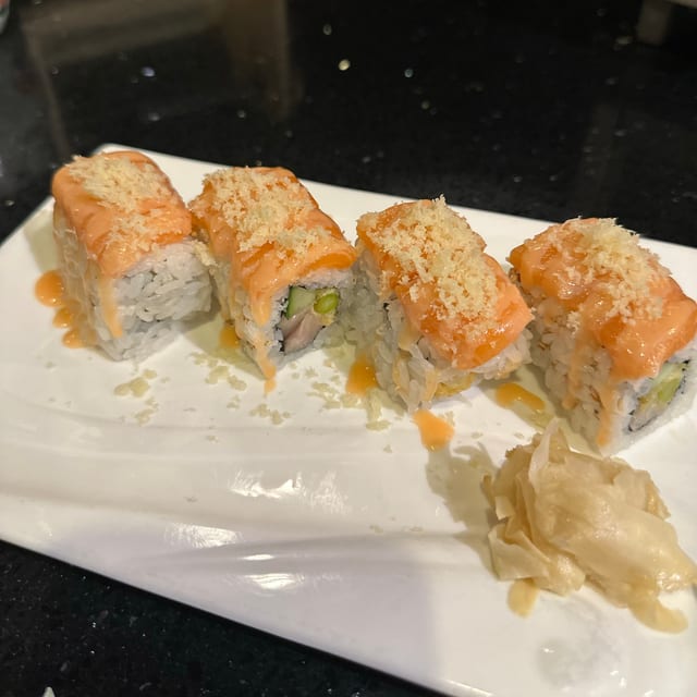 Honey Bunny Roll - Yellowtail, tempura asparagus and cucumber inside,…n, tempura crunchy and special honey sauce on top.